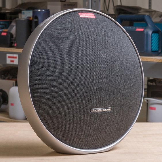 Harman Kardon Onyx Studio 9 speaker showing integrated aluminium handle and stand